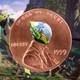 A penny has an the face of an Anthem character stamped on it, replacing Abraham Lincoln.